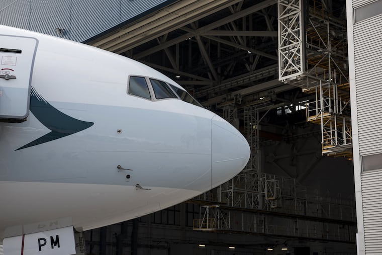 A Cathay Pacific Boeing 777 passenger jet. Boeing is in the midst of cutting thousands of jobs across the company, including over 100 in Pennsylvania.