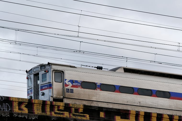 File photo of a SEPTA regional rail train crossing over the Schuylkill in Philadelphia on Saturday, Jan. 2, 2021.