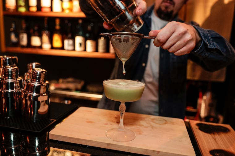 Head bartender Rob Scott making a Sadōtini at the Bar Almanac at Ogawa, 310 Market St.