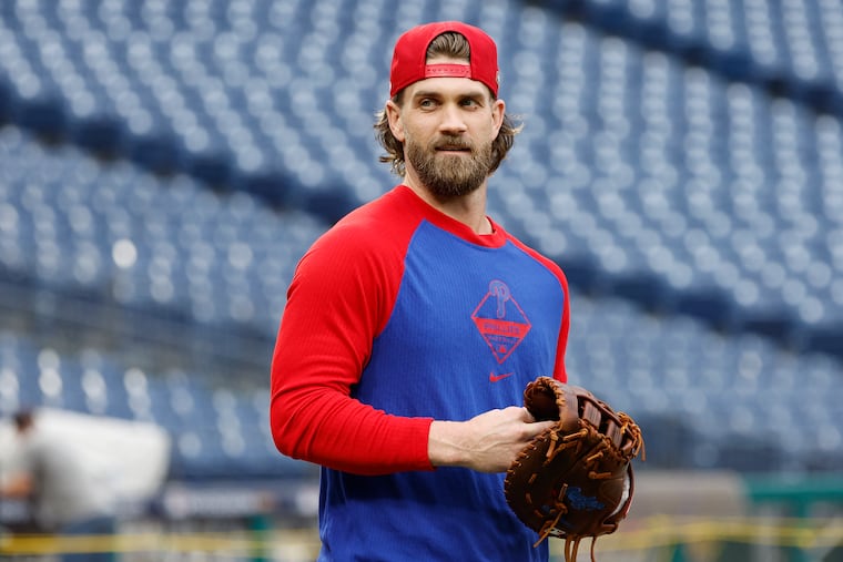 Offense among outfielders is nearly as bad as it has been across baseball in the last 50 years. But the Phillies haven't discussed moving slugger Bryce Harper back to the outfield.