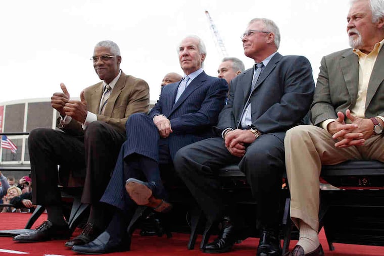 Among those attending Tuesday's ceremonies were (from left) former 76ers great Julius Erving, Ed Snider, chairman of Comcast-Spectacor, and former Flyers Bob Clarke and Bernie Parent.