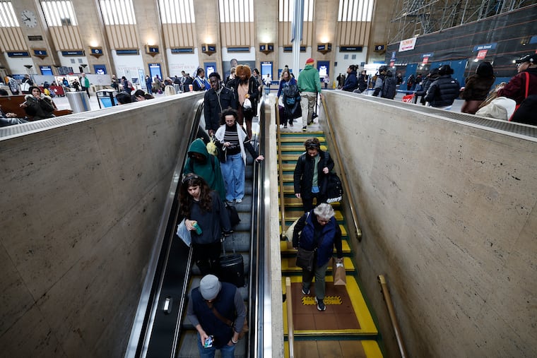 Amtrak riders made their way to the platform to board a Keystone train at the William H. Gray III 30th Street Station on Sunday. Some passengers say they have seen higher round-trip fares than they can recall in recent years.