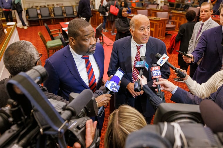 Council President Kenyatta Johnson with Councilmember Mark Squilla address media questions during a Sixers arena hearing last month. Council members could vote on the arena project as early as Thursday morning.