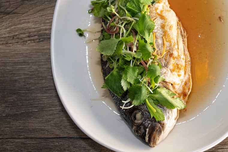 Whole fish is shown at Mawn restaurant in South Philadelphia.