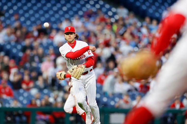 Phillies third baseman Alec Bohm throws out New York Mets Starling Marte in the second inning on Monday, April 11, 2022 in Philadelphia.