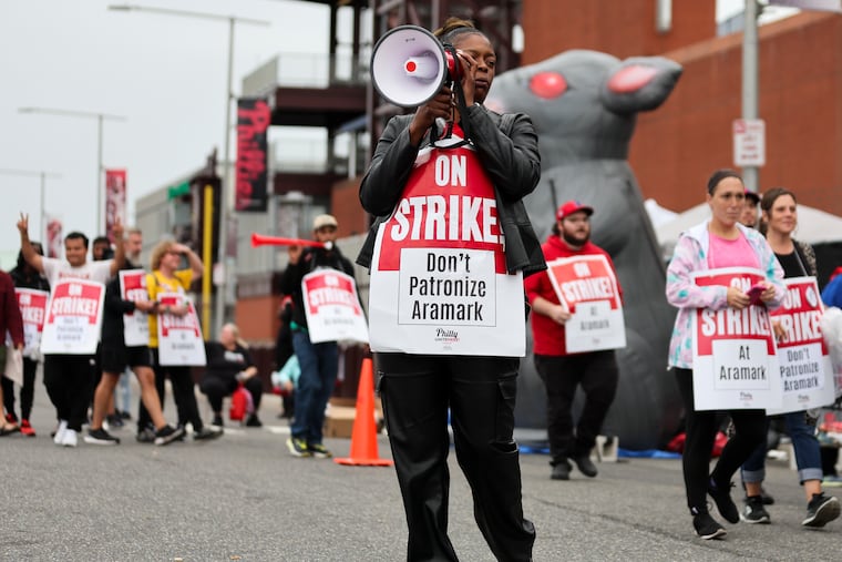Members of Unite Here, who are employed by Aramark, picket outside of Citizens Bank Park before the Philadelphia Phillies game against the Chicago Cubs on Sept. 23.