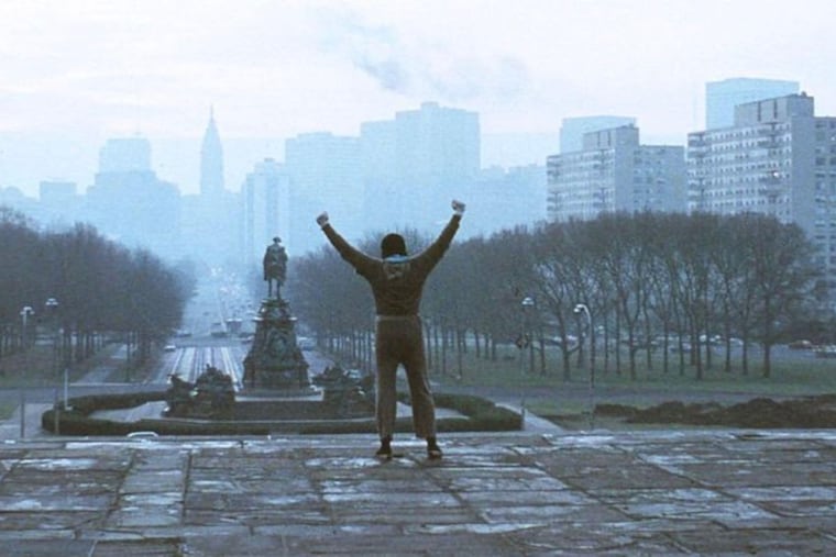 Sylvester Stallone looking at the city skyline from the Philadelphia Museum of Art steps in "Rocky."
