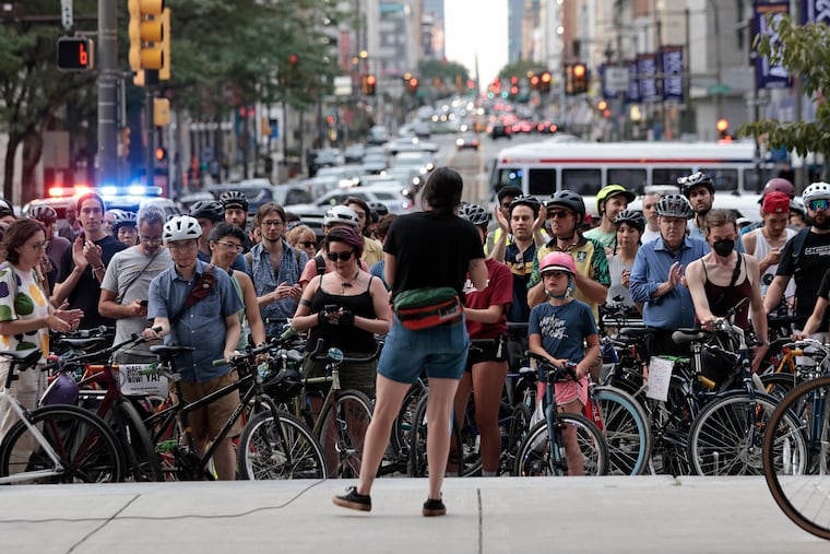 A group of cyclists gathers at City Hall in July to protest what they see as a lack of commitment to traffic safety from Mayor Cherelle L. Parker.