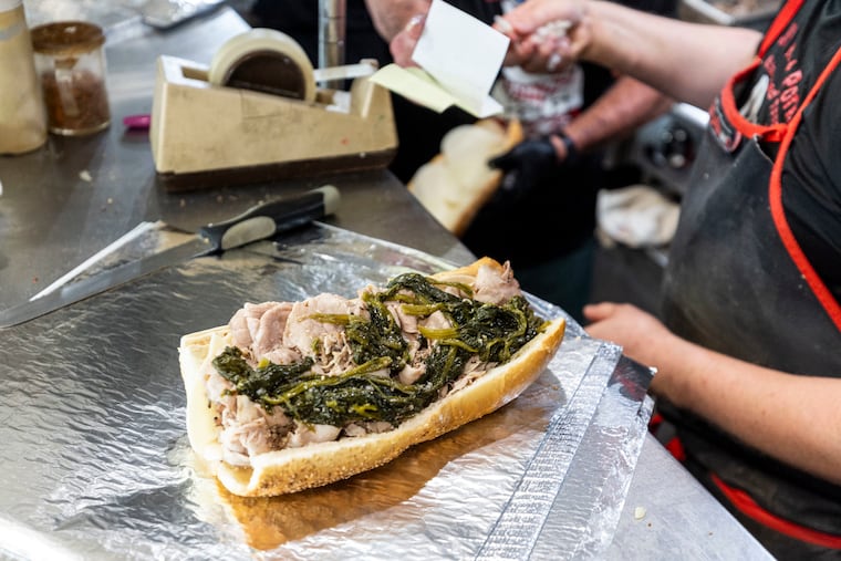 A Roast Pork Sandwich with Spinach at John’s Roast Pork in Philadelphia, Pa., on Friday, Sept., 13, 2024. .