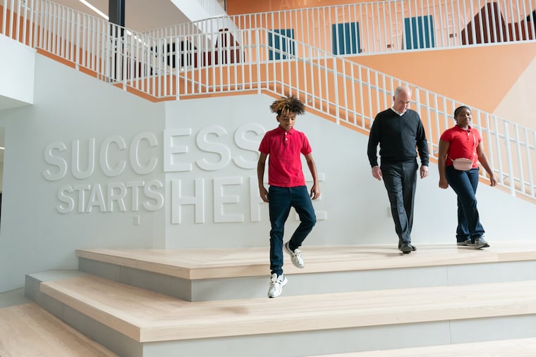 (Left to Right) Sen. Bob Casey with 8th grader Yasir Martin, and 7th grader Zuriel Guy, at the Lewis C Cassidy School, in Philadelphia, Tuesday, November 26, 2024.